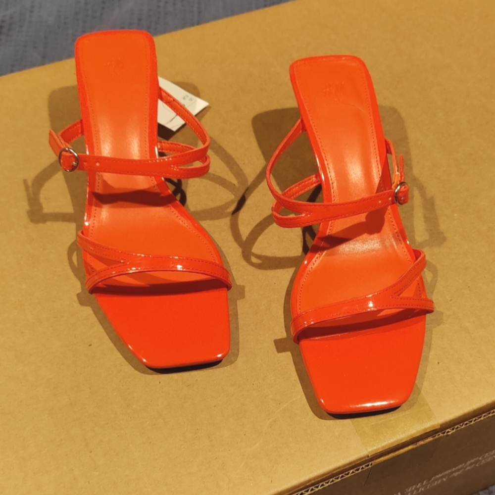Bright orange strappy heeled sandal